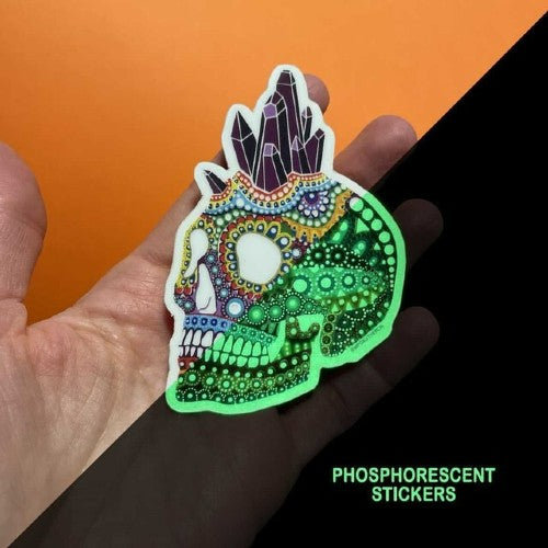 Glow in the dark vinyl for printing shown in a phosphorescent sticker featuring a decorated skull design