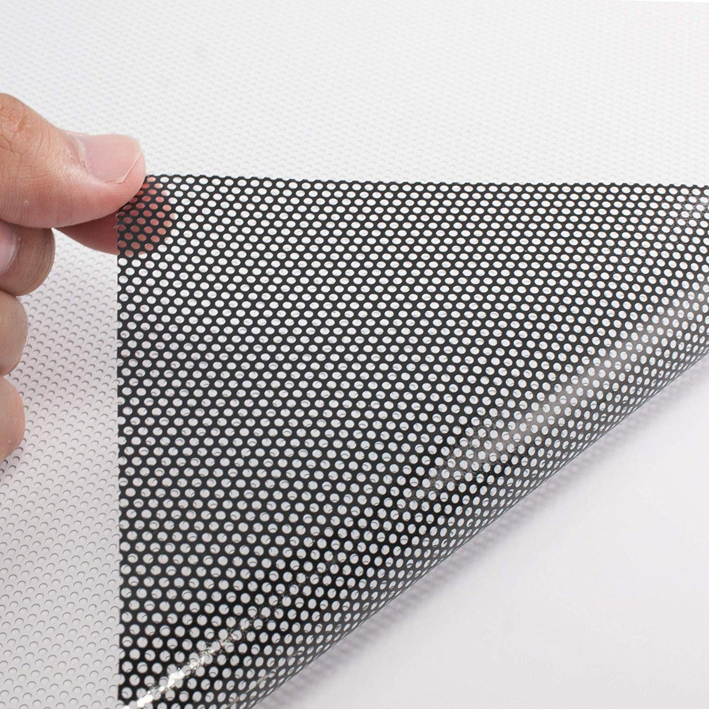 Media One Vinyl Window Perf film with a textured surface for effective advertising and visibility
