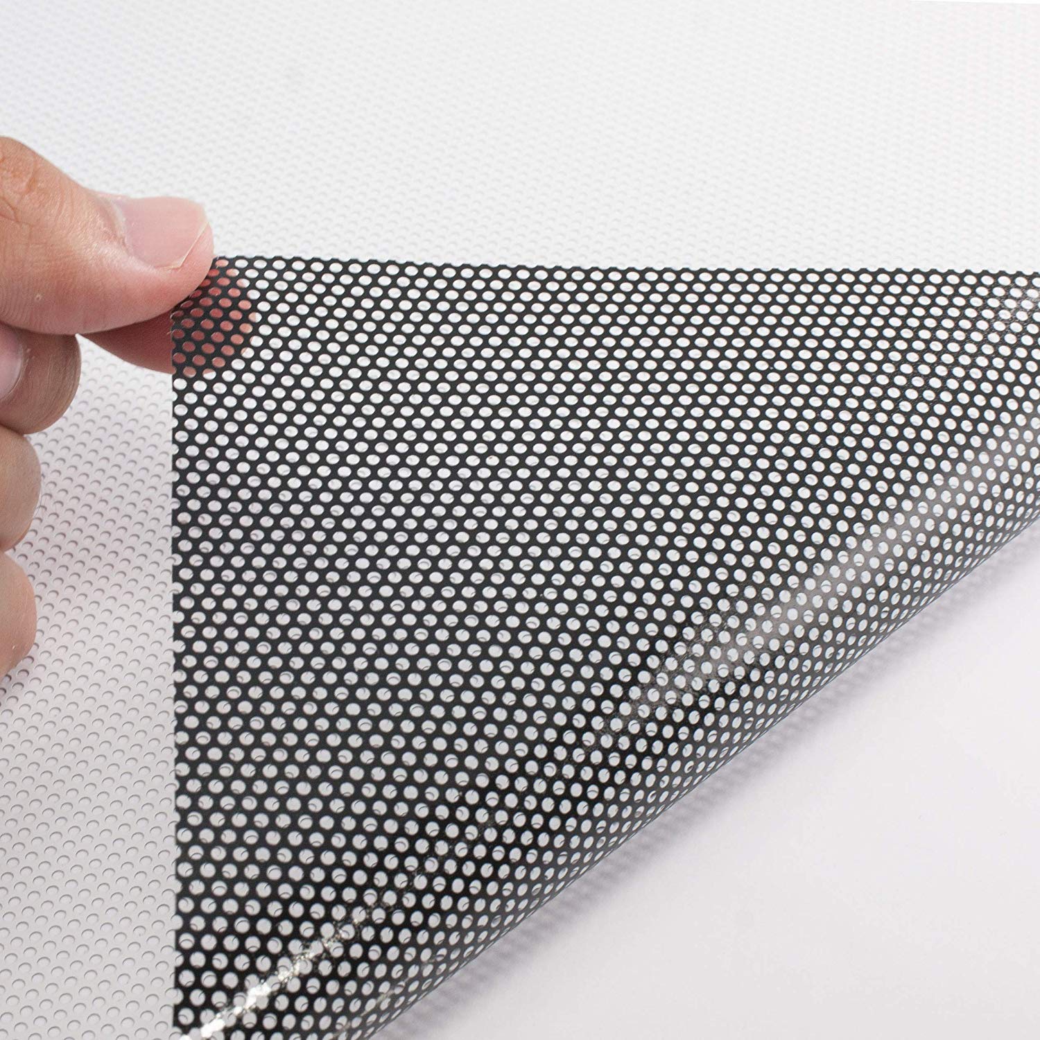 Media One Vinyl Window Perf film with a textured surface for effective advertising and visibility